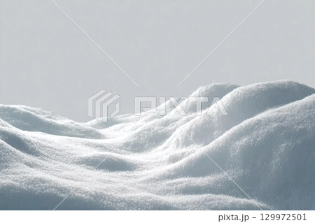Beautiful snowdrift isolated on white background. Winter snow background. A big snow drift 129972501