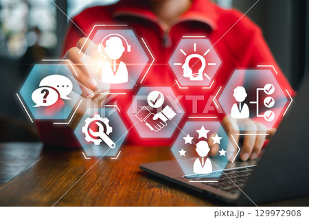 A professional IT expert interacts with a digital interface, showcasing technology and innovation concepts. A professional IT expert interacts with a digital interface, showcasing technology and innovation concepts. 129972908