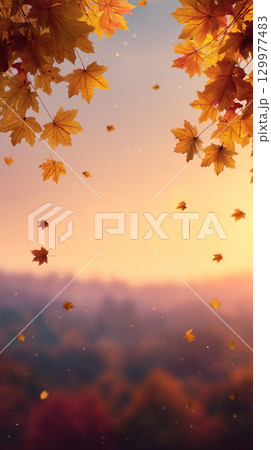 【秋素材】紅葉と夕暮れ空に舞う落ち葉の背景・文字スペースあり 129977483