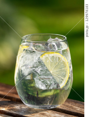 glass of water with ice and lemon 129978183