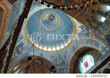 Orthodox Church Dome With Blue Mosaic of Christ 129980453