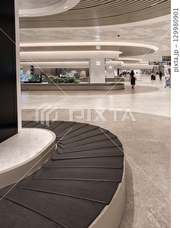 Modern architectural design features in spacious Changi Airport terminal 129980901