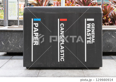 Recycling bin for paper, cans, plastic waste in Orchard Road Singapore Recycling bin for paper, cans, plastic waste in Orchard Road Singapore 129980914