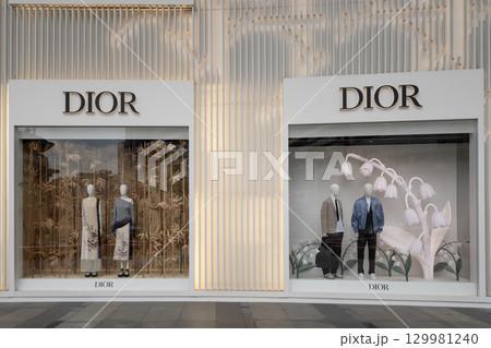 Dior storefront display on Orchard Road showcasing elegant fashion styles 129981240
