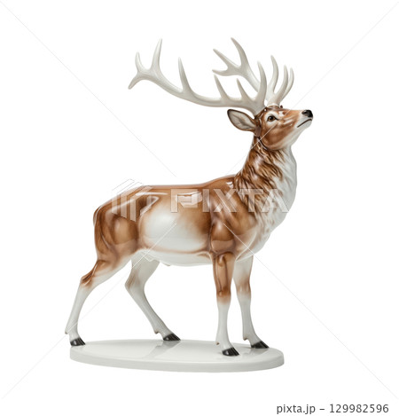 Porcelain figurine of a majestic red deer stag with large antlers standing proudly looking up 129982596