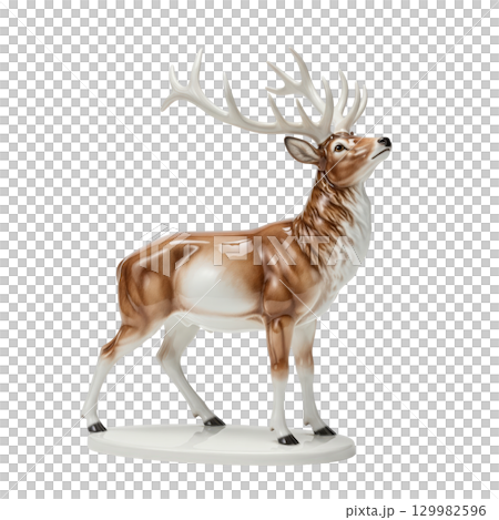Porcelain figurine of a majestic red deer stag with large antlers standing proudly looking up 129982596