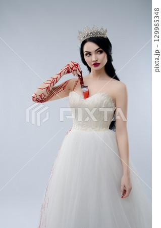 Bridal beauty with a sinister twist in a hauntingly elegant display Bridal beauty with a sinister twist in a hauntingly elegant display 129985348