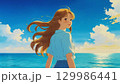 青空のお昼の静かな海に立つ若い女性。前向きなイメージ。 129986441