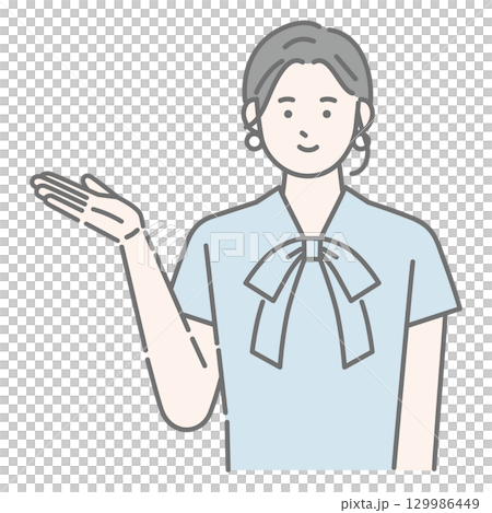 案内をする笑顔の女性 案内をする笑顔の女性 129986449