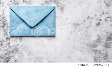 Elegant blue envelope on marble background for stationery or invitation design, contact info or offers Elegant blue envelope on marble background for stationery or invitation design, contact info or offers 129987874