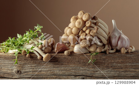 Fresh shimeji mushrooms with thyme and garlic. Fresh shimeji mushrooms with thyme and garlic. 129988904