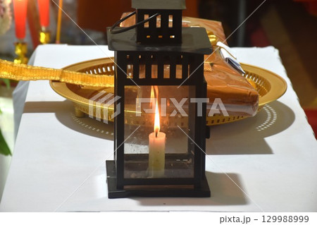 lantern for burning sandalwood flower and robes for monks in Buddhist funerel 129988999