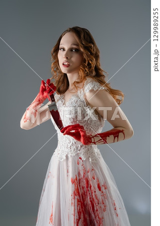 Bridal beauty with katana evokes a tale of blood and revenge Bridal beauty with katana evokes a tale of blood and revenge 129989255