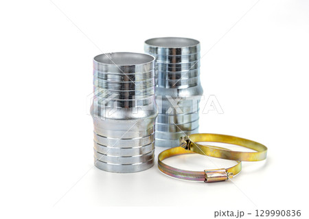 Two metal pipe connector with brass strap shiny silver surface industrial fitting plumbing accessory isolated on white background clean and minimal practical tool connection equipment Two metal pipe connector with brass strap shiny silver surface industrial fitting plumbing accessory isolated on white background clean and minimal practical tool connection equipment 129990836