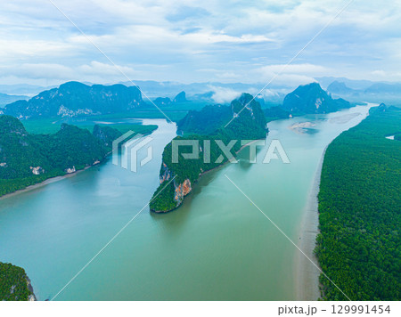 Aerial top view Colorful house roofs on a village on Koh Panyee. Aerial top view Colorful house roofs on a village on Koh Panyee. 129991454