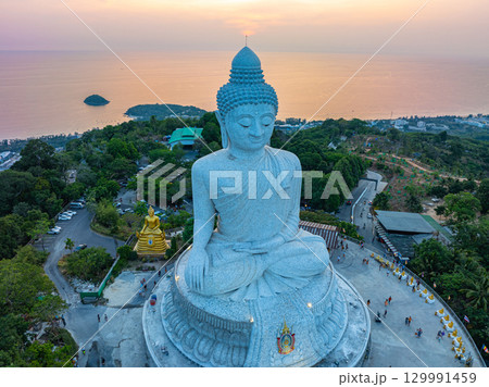 Aerial view scenery yellow sky at sunrise above Phuket Big Buddha Aerial view scenery yellow sky at sunrise above Phuket Big Buddha 129991459