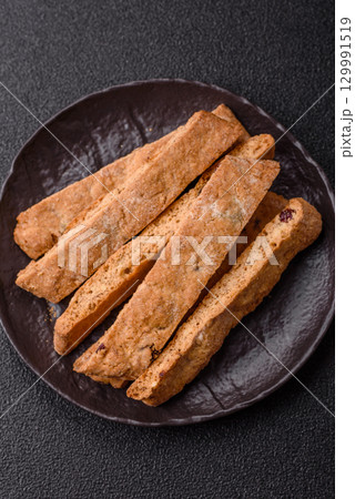 Biscotti or cantuccini biscuits, a crispy sweet Italian pastry. Biscotti dessert 129991519