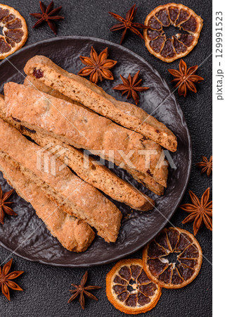 Biscotti or cantuccini biscuits, a crispy sweet Italian pastry. Biscotti dessert Biscotti or cantuccini biscuits, a crispy sweet Italian pastry. Biscotti dessert 129991523