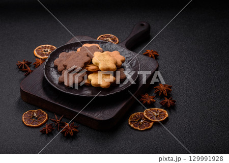 Sweet crispy biscuit with cocoa flavor, baking at home. Biscuit as a dessert Sweet crispy biscuit with cocoa flavor, baking at home. Biscuit as a dessert 129991928