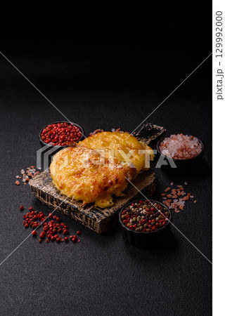 Steak, a pork or chicken chop covered with melted cheese. Grilled meat 129992000