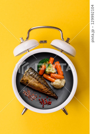 Grilled mackerel fish with peppers and spices. Concept time to eat fish 129992104