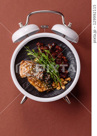 Grilled mackerel fish with peppers and spices. Concept time to eat fish 129992115