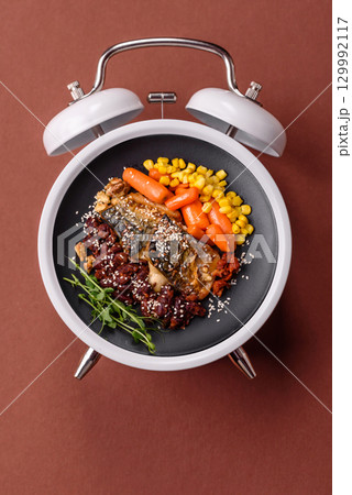 Grilled mackerel fish with peppers and spices. Concept time to eat fish 129992117