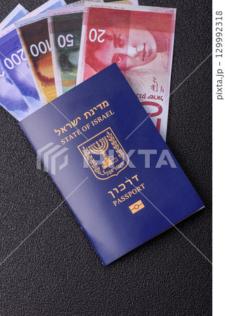 Israel passport for travelling, flying and doing business. Israeli document, id Israel passport for travelling, flying and doing business. Israeli document, id 129992318