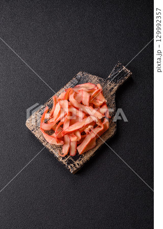 Food, dried squid in shavings or chopped as snacks or jerky. Snack dried squid for beer Food, dried squid in shavings or chopped as snacks or jerky. Snack dried squid for beer 129992357