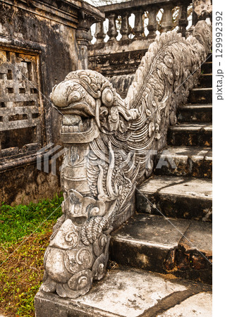 Stone dragon stair detail from ancient royal architecture in Hue Vietnam Stone dragon stair detail from ancient royal architecture in Hue Vietnam 129992392