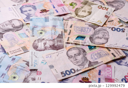 Ukrainian money, hryvnia, paper banknotes, cash. Ukrainian money for business Ukrainian money, hryvnia, paper banknotes, cash. Ukrainian money for business 129992479