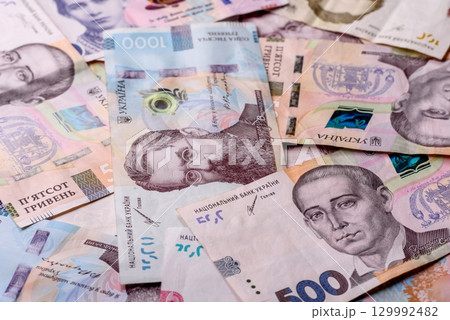 Ukrainian money, hryvnia, paper banknotes, cash. Ukrainian money for business 129992482
