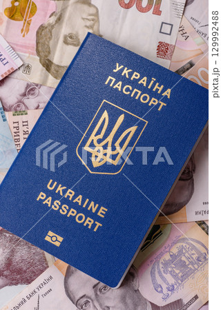 Ukrainian passport for travelling, flying and doing business. Ukraine document Ukrainian passport for travelling, flying and doing business. Ukraine document 129992488