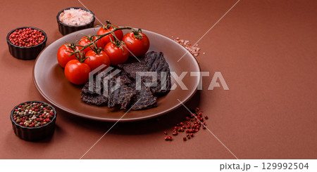 Snacks or jerky, beef slice meat dried, dehydrated. Beef snack Snacks or jerky, beef slice meat dried, dehydrated. Beef snack 129992504