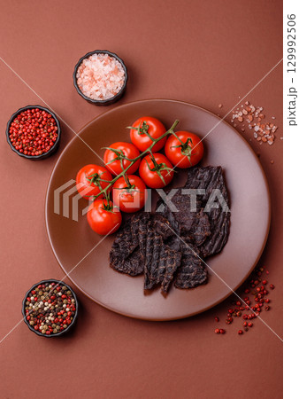Snacks or jerky, beef slice meat dried, dehydrated. Beef snack Snacks or jerky, beef slice meat dried, dehydrated. Beef snack 129992506