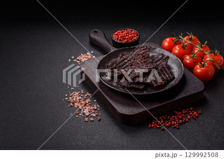 Snacks or jerky, beef slice meat dried, dehydrated. Beef snack Snacks or jerky, beef slice meat dried, dehydrated. Beef snack 129992508