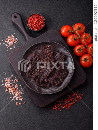 Snacks or jerky, beef slice meat dried, dehydrated. Beef snack Snacks or jerky, beef slice meat dried, dehydrated. Beef snack 129992510