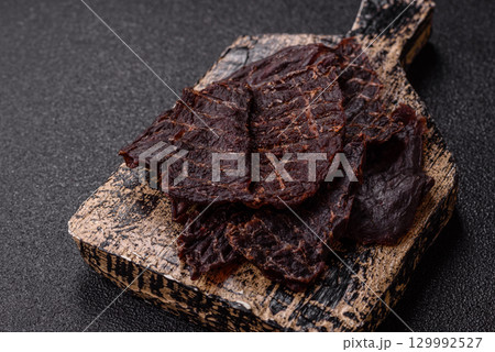 Snacks or jerky, beef slice meat dried, dehydrated. Beef snack Snacks or jerky, beef slice meat dried, dehydrated. Beef snack 129992527