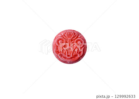 Chinese mooncake is an Asian sweet dessert. Asian mooncake as a background for your design Chinese mooncake is an Asian sweet dessert. Asian mooncake as a background for your design 129992633