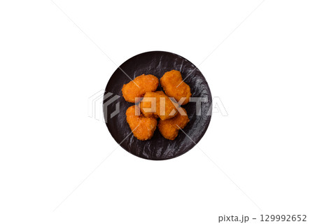 Chicken nuggets in breading, takeaway food, junk food 129992652
