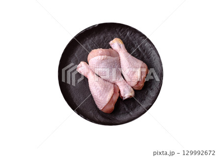 Raw chicken legs, fresh uncooked poultry meat. Chicken or turkey legs 129992672