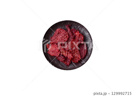Jerky or dried chicken and cherry snacks. Dehydrated, dried snacks for beer Jerky or dried chicken and cherry snacks. Dehydrated, dried snacks for beer 129992715