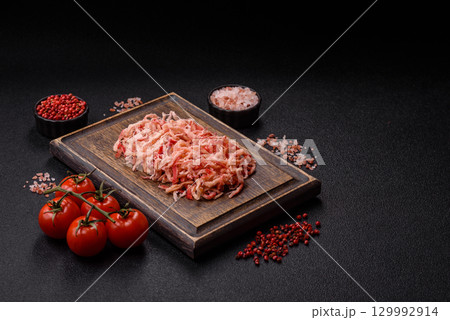 Food, dried squid in shavings or chopped as snacks or jerky. Snack dried squid for beer Food, dried squid in shavings or chopped as snacks or jerky. Snack dried squid for beer 129992914