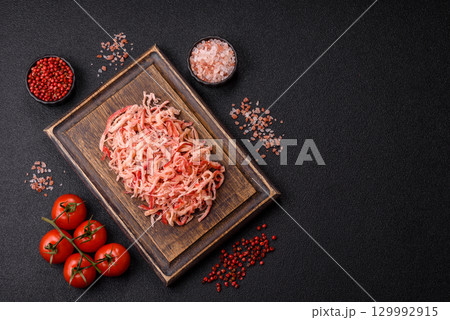 Food, dried squid in shavings or chopped as snacks or jerky. Snack dried squid for beer Food, dried squid in shavings or chopped as snacks or jerky. Snack dried squid for beer 129992915