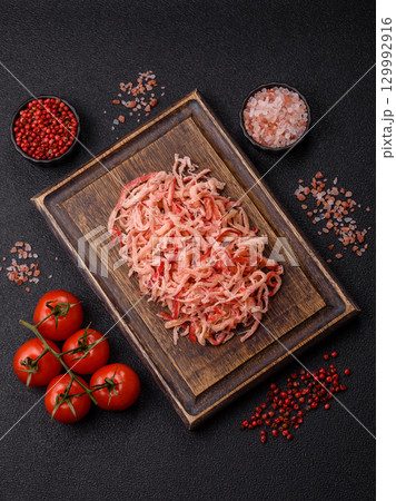 Food, dried squid in shavings or chopped as snacks or jerky. Snack dried squid for beer Food, dried squid in shavings or chopped as snacks or jerky. Snack dried squid for beer 129992916