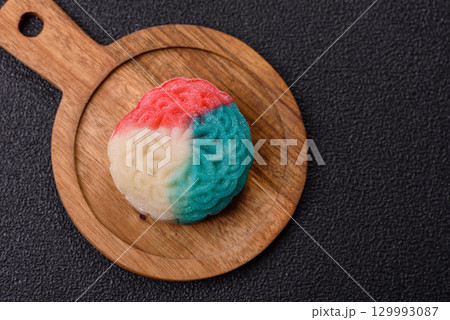 Chinese mooncake is an Asian sweet dessert. Asian mooncake as a background for your design Chinese mooncake is an Asian sweet dessert. Asian mooncake as a background for your design 129993087
