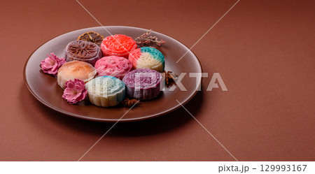 Chinese mooncake is an Asian sweet dessert. Asian mooncake as a background for your design 129993167