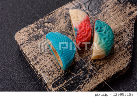 Chinese mooncake is an Asian sweet dessert. Asian mooncake as a background for your design 129993188