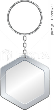A silver keychain with a hexagon-shaped pendant dangles in front of a stark black background. 129993768