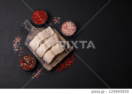White fish fillets, seafood cooked with salt and spices. Fish fillets 129993859